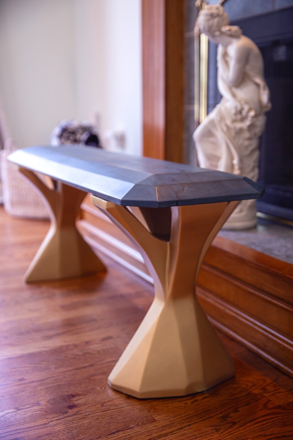 Sculptural custom bench with geometric legs