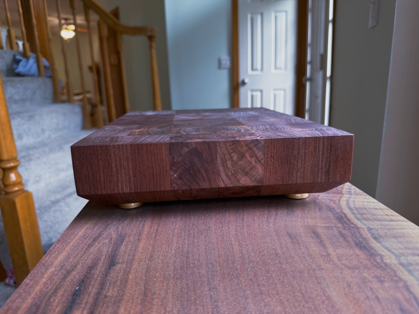 Close-up walnut end-grain joinery and finish detail